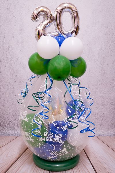 Geschenk im Ballon verpackt, Verpackungsballon mit Zahl 20 zum Geburtstag